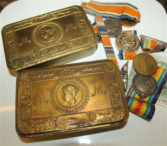 2 tins, mixed medals and a brooch